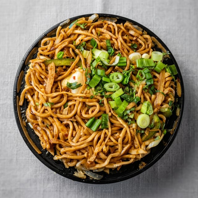 Veg Hakka Noodles with Manchurian.
